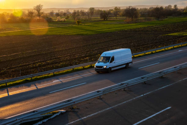 Man with a Van delivering parcels across the UK at sunset